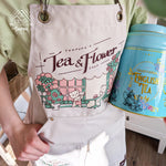 Load image into Gallery viewer, Canvas Apron - Tea &amp; Flower
